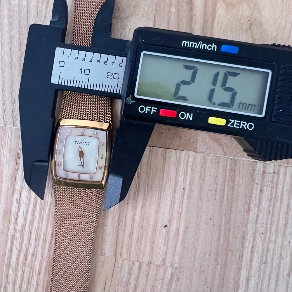 Skagen Denmark ladies rectangular rose gold tone dress watch NEW BATTERY